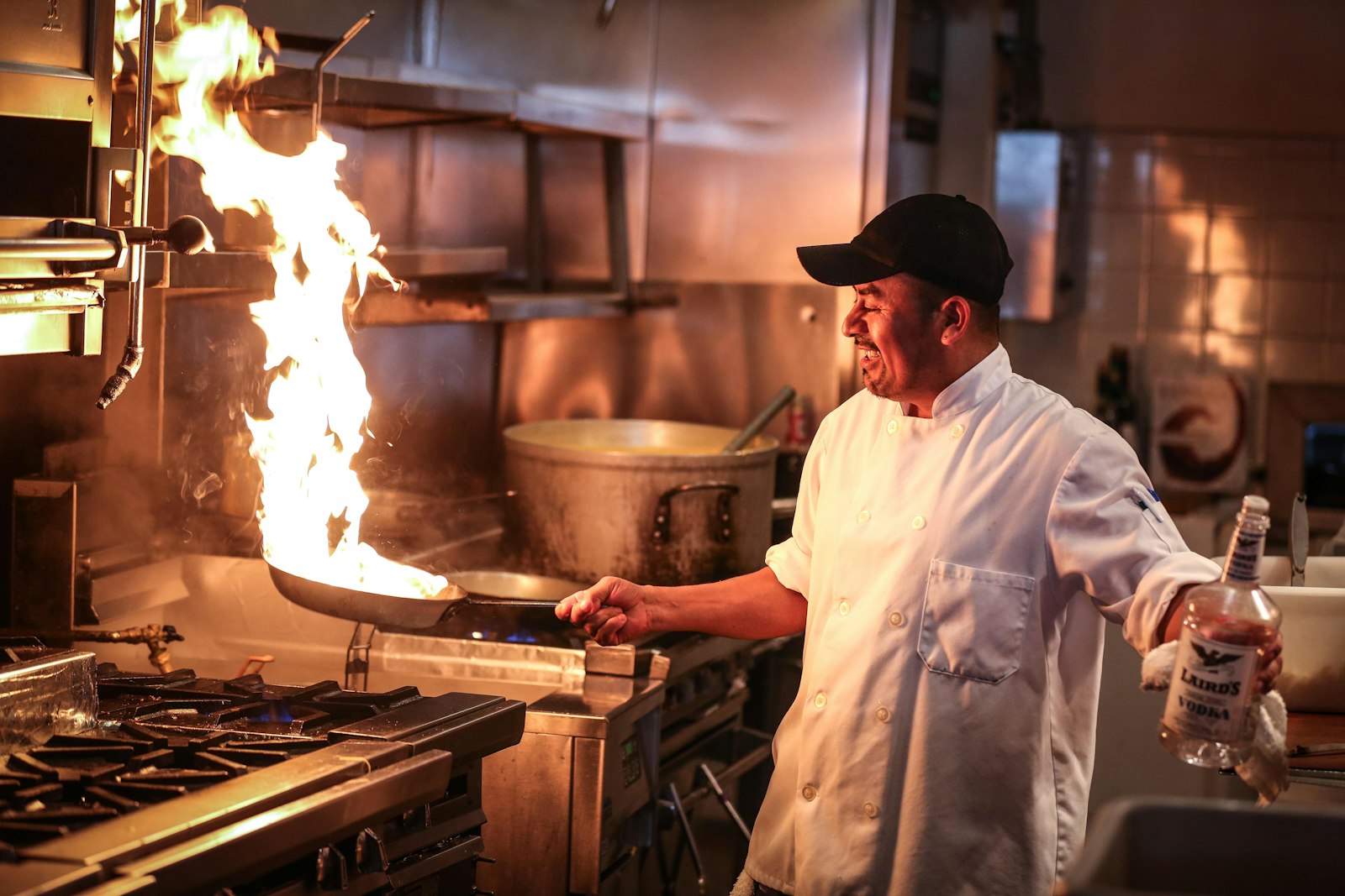 Chef preparing food in a controlled kitchen environment